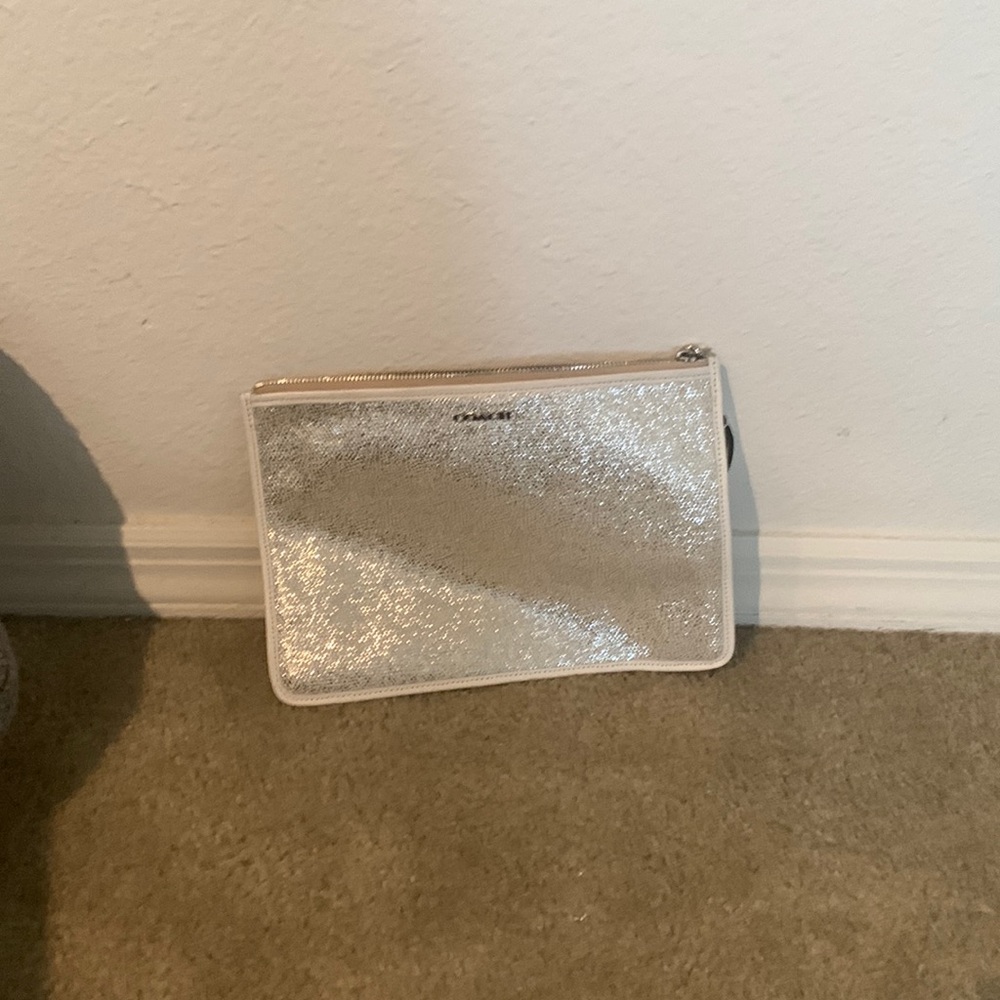 Coach wristlet silver used once 7 by 9